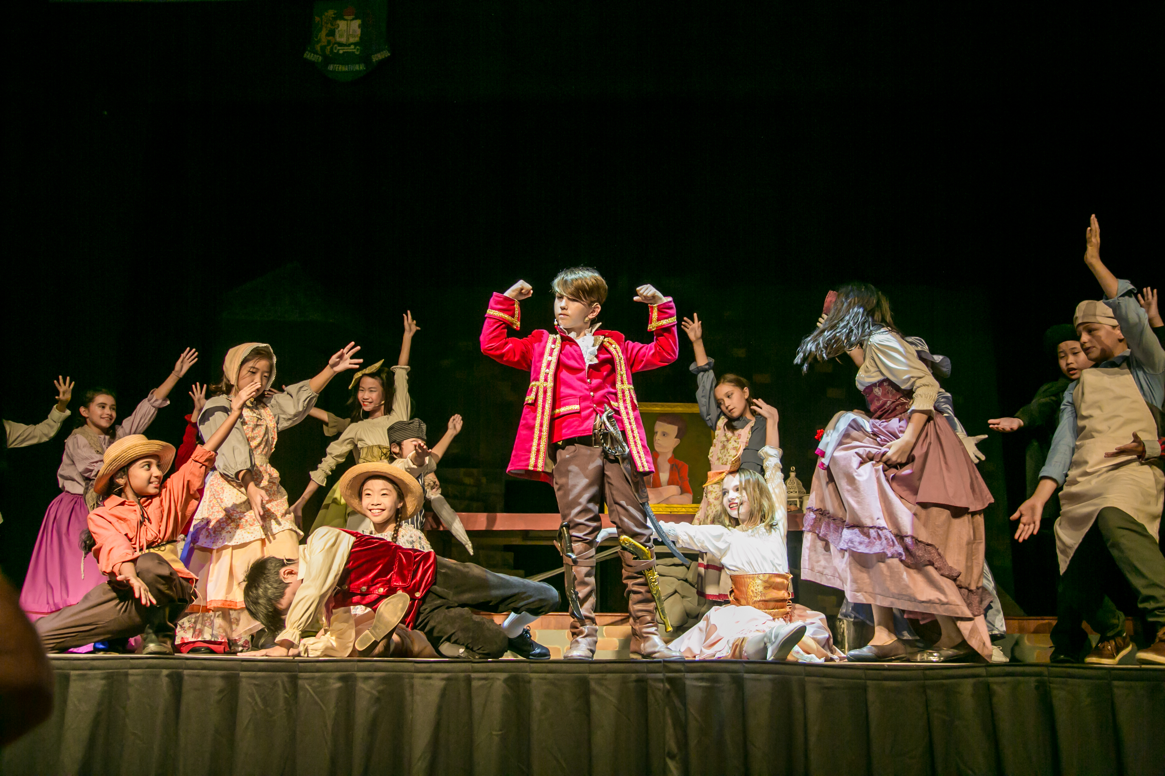 A musical stage performance by students dressed up as characters