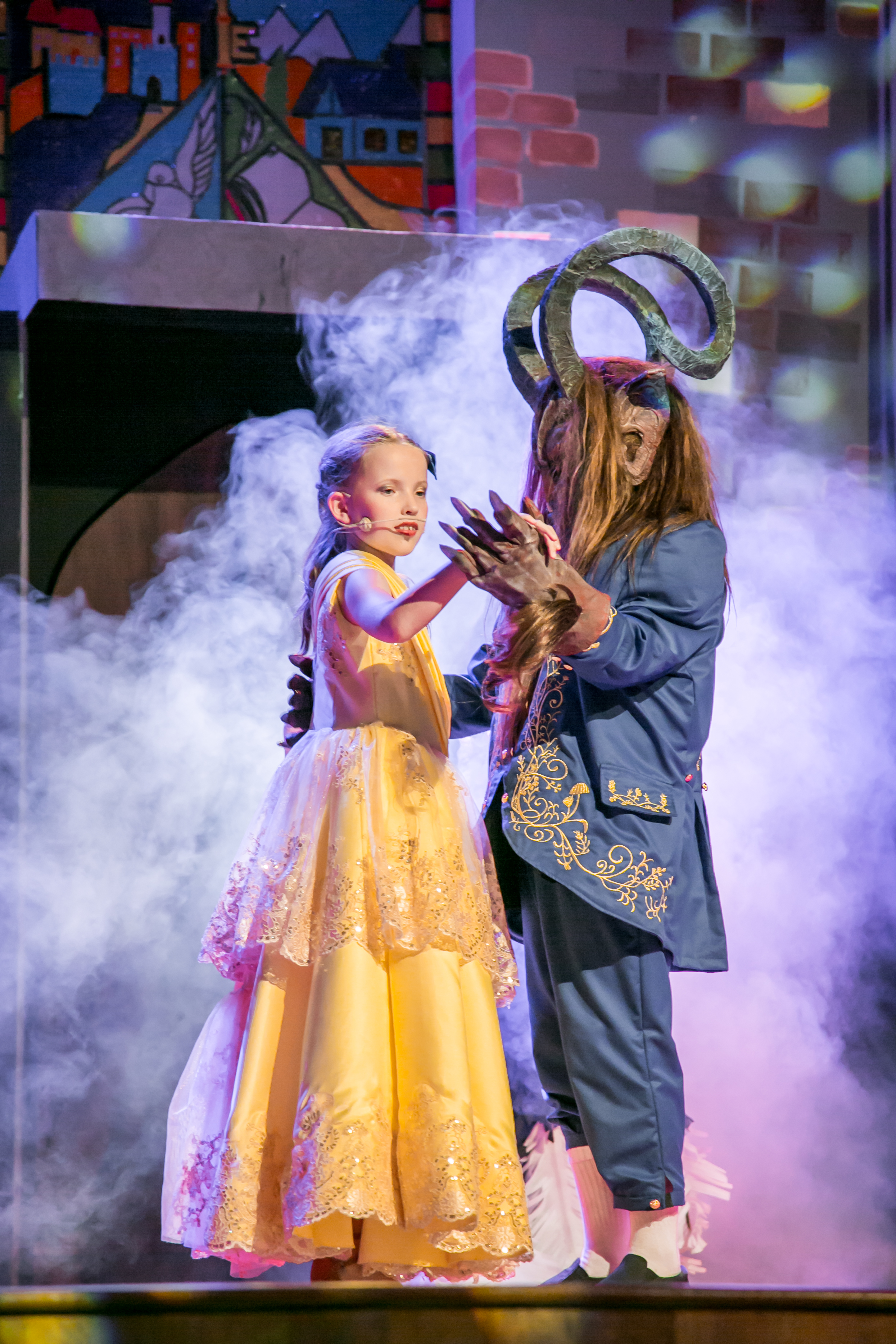 Two kids performing Beauty and the Beast